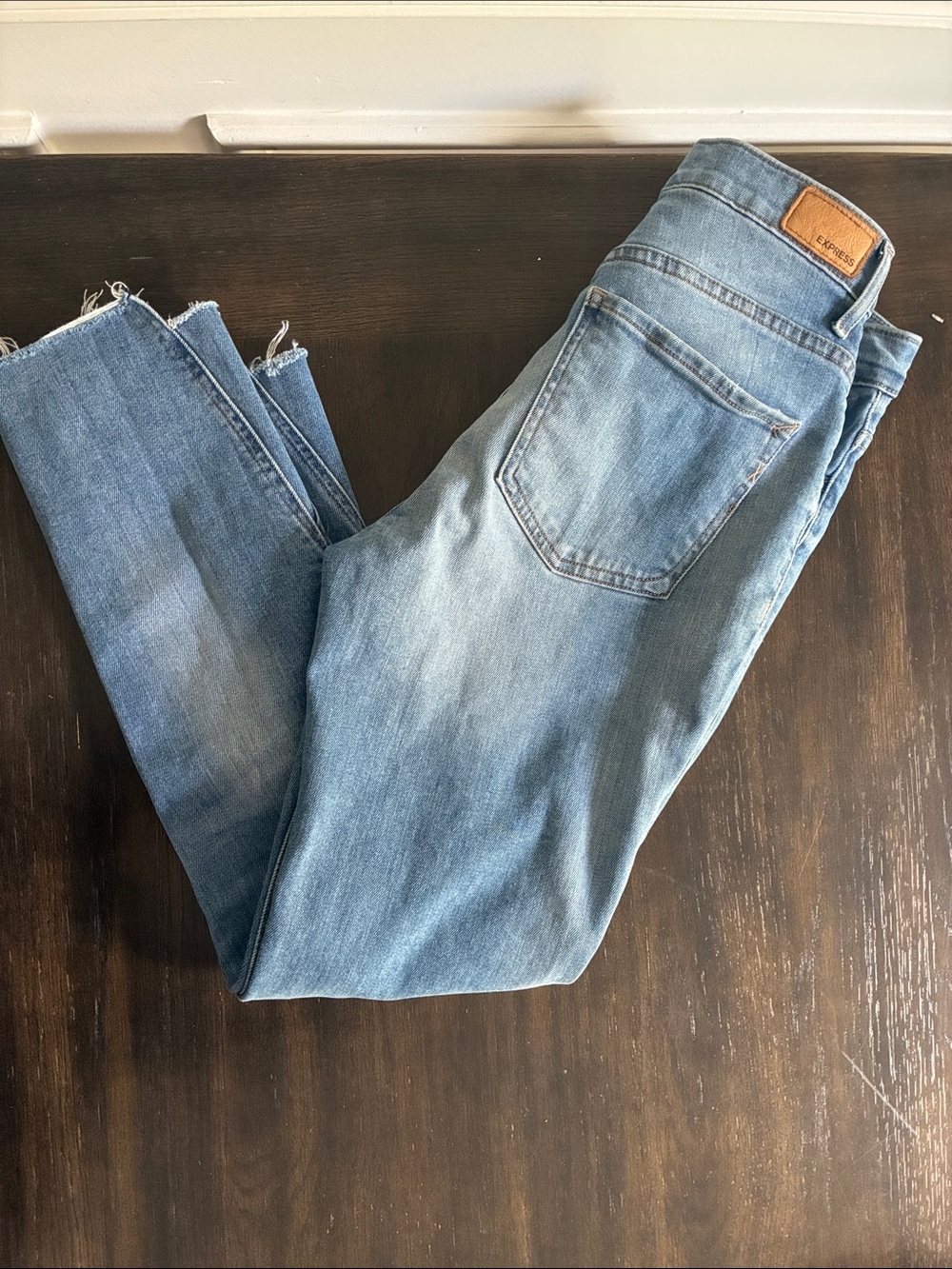Express Light Blue Straight-Leg Denim Jeans with Raw Hem